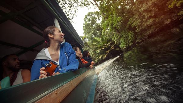 Travellers marvelling in awe at the rainforest in Costa Rica